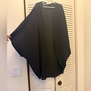 Sheer black open jacket/blouse.Wear over tank tops or over bathing suit. Size M